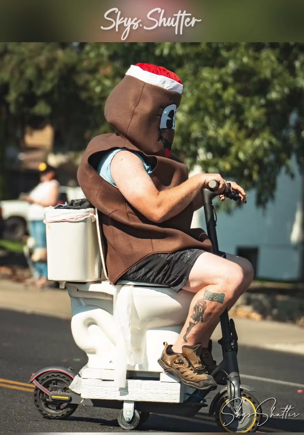 Dookie Septic's toilet-scooter costume rider at the 2025 Yakima SunFair Parade